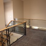 Glass Stair Walls with Wooden Railing