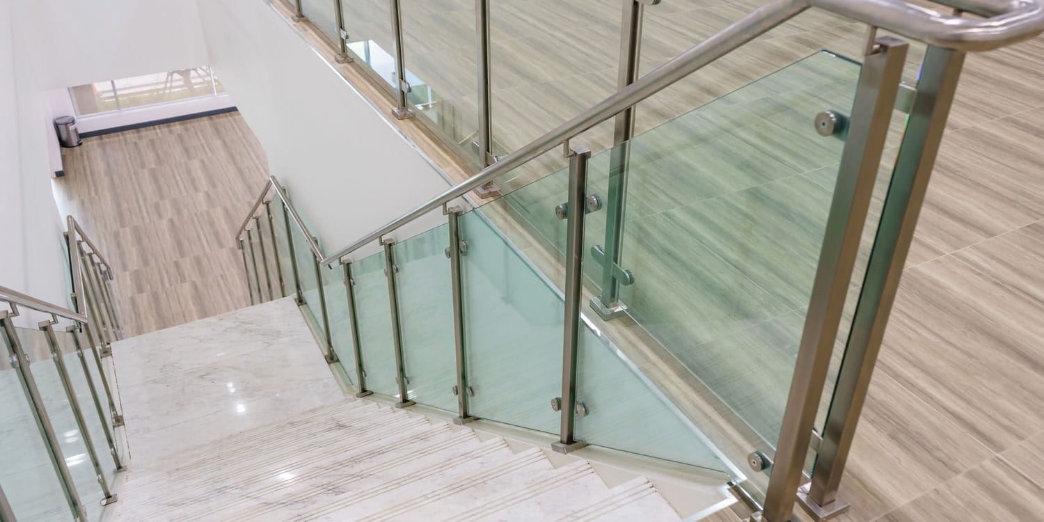 Glass railings installed on a staircase at a local business in Salt Lake City
