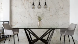 A modern glass dining table with two chairs