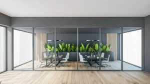 a custom glass partition separating a conference space from the rest of the office